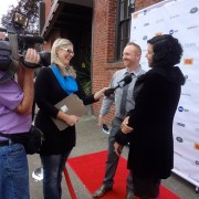 Attendees being interviewed on the red carpet at Oregon Actors Awards. Photo by Byron Beck.