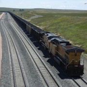 Union Pacific train with open bed coal cars. Photo Credit: Wusel007, public domain