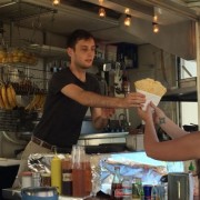 Tyler Helton making crepes at Perierra Creperie, a food cart on SE 12th and Hawthorne Blvd. Photo by Emily Liedel